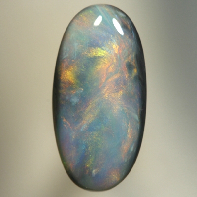 SOLID SEMI BLACK OPAL Glowing with a red Sheen pattern over blue